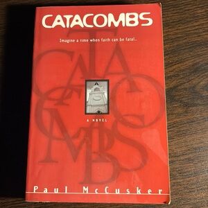 Catacombs by Paul McCusker - Red Hardcover Novel